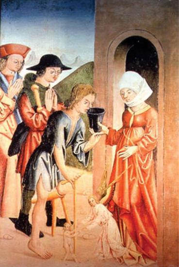 Béguine pratiquant la charité à la porte de son béguinage - Miniature (1485).